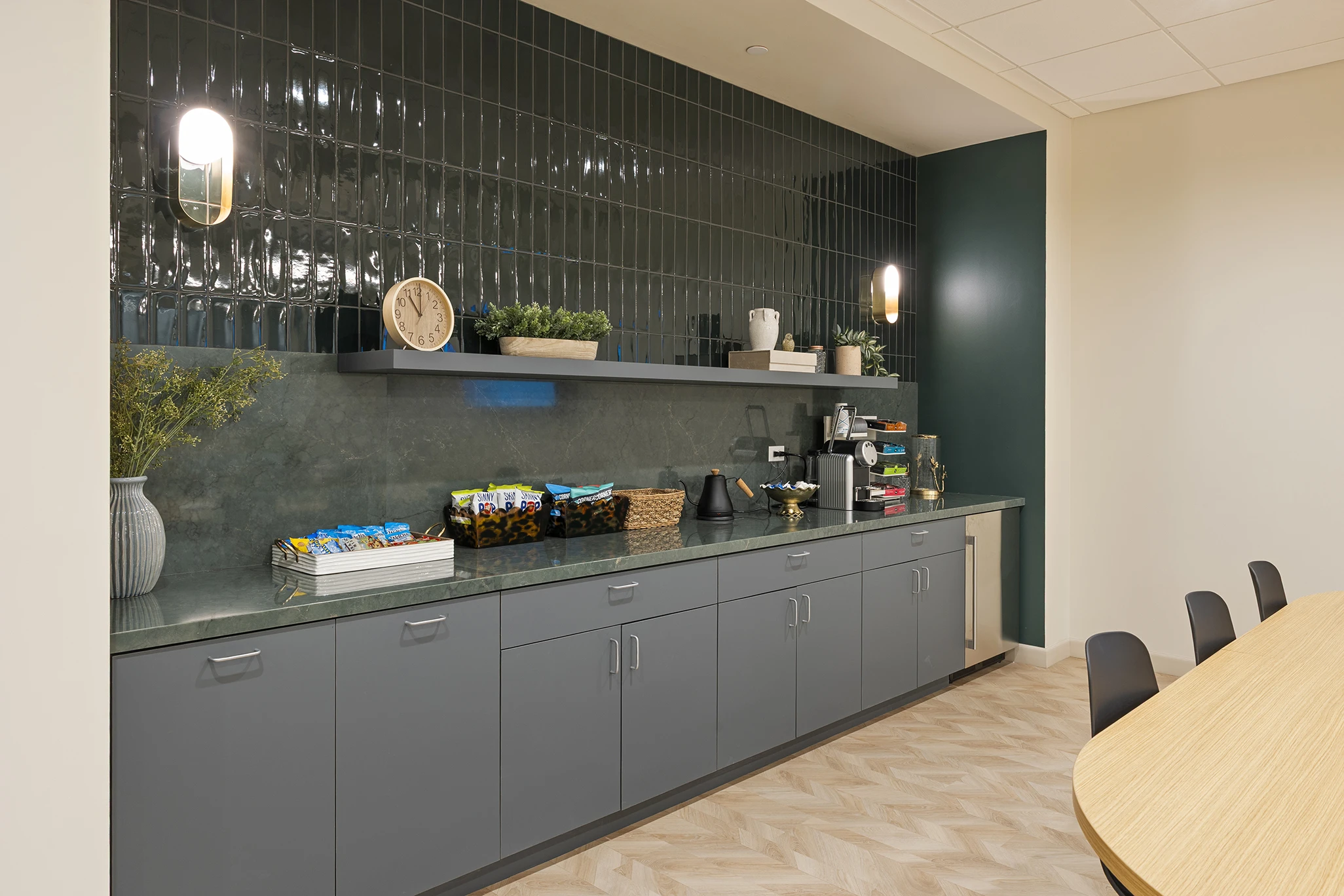 True Health Buffalo Grove office patient lounge with refreshment bar, snacks, and coffee station